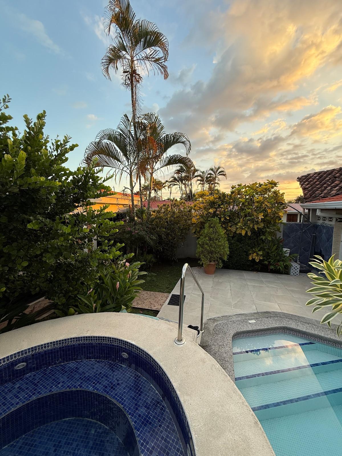 Spa and pool at Casa Jannat under a sunset sky